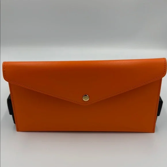 MCM Vibrant Orange Leather Clutch